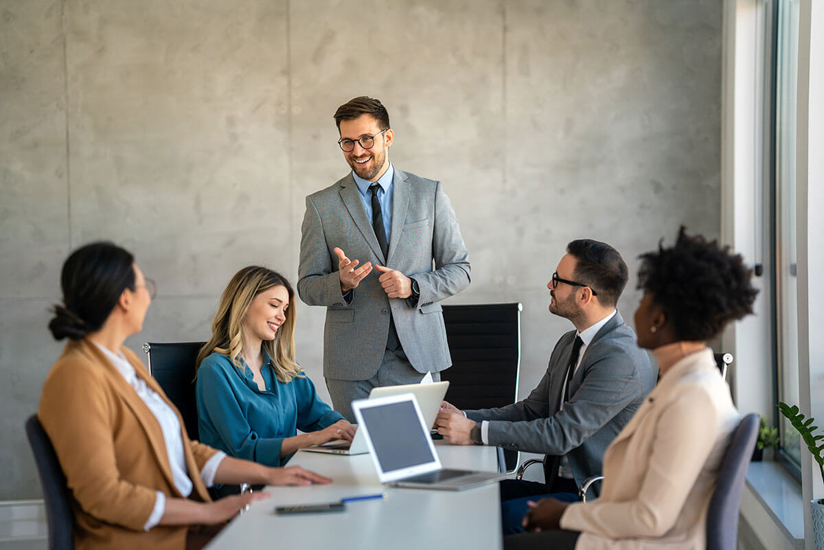 Consultant discussing IT priorities with not-for-profit leadership team