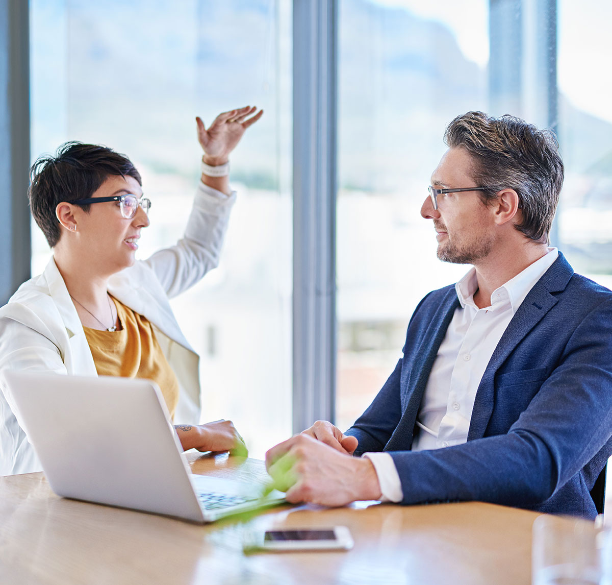 Consultants reviewing financial reports
